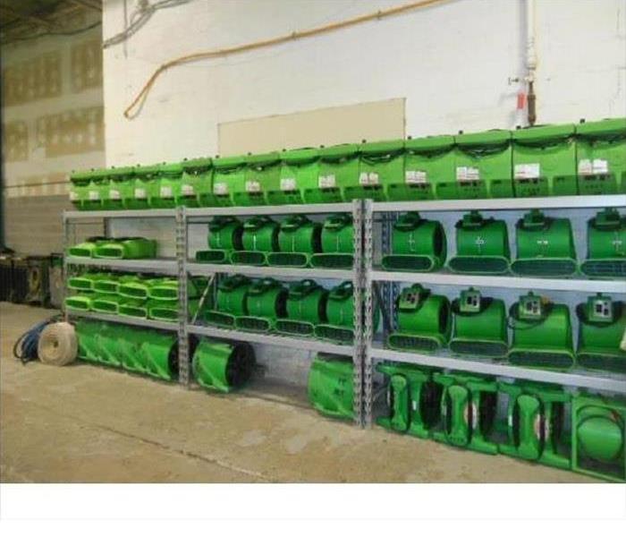 Air movers on a shelve in a warehouse ready to be used
